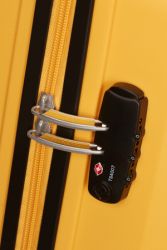American Tourister Summer Splash keskisuuri matkalaukku, honey yellow